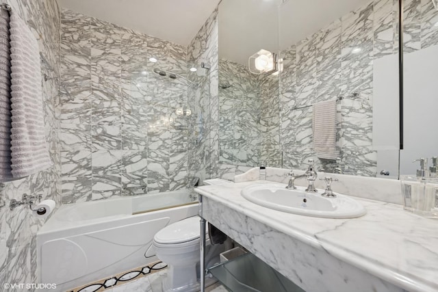65 W Schiller St, Chicago, IL 60610 - bathroom featuring vanity, washtub / shower combination, and tile walls