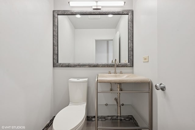 65 W Schiller St, Chicago, IL 60610 - half bathroom featuring toilet and vanity