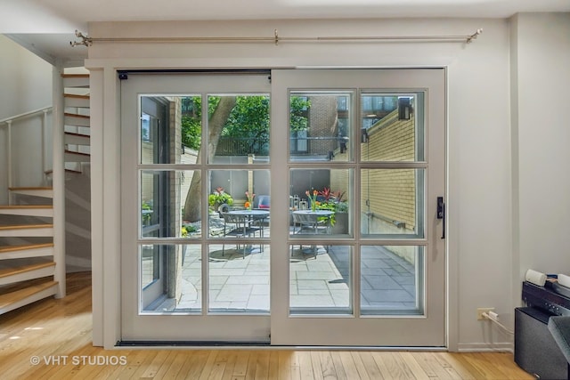 65 W Schiller St, Chicago, IL 60610 - entryway featuring stairway and hardwood / wood-style flooring