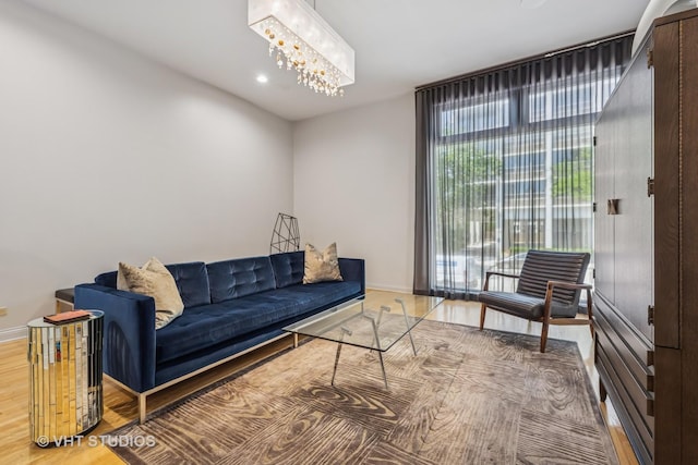 65 W Schiller St, Chicago, IL 60610 - living room with wood finished floors and a chandelier