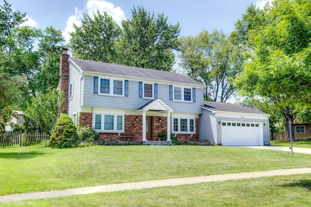 950 Belmar Ln, Buffalo Grove, IL 60089 - colonial inspired home featuring a chimney, concrete driveway, an attached garage, and brick siding