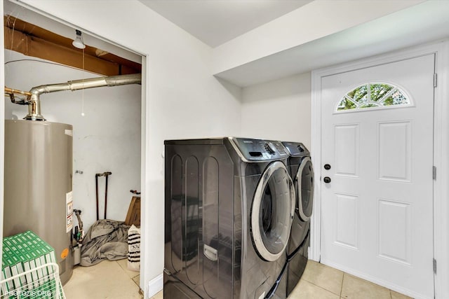 950 Belmar Ln, Buffalo Grove, IL 60089 - laundry room featuring light tile patterned floors, washing machine and clothes dryer, and water heater