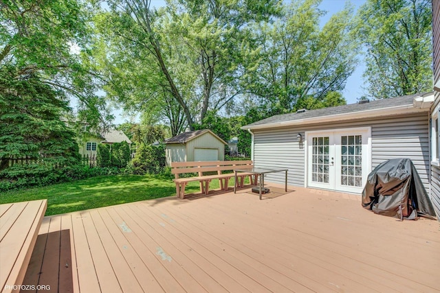 950 Belmar Ln, Buffalo Grove, IL 60089 - wooden terrace with french doors, a lawn, a shed, and a grill