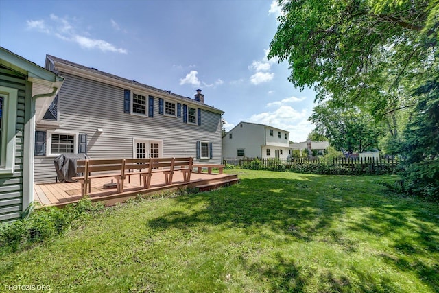 950 Belmar Ln, Buffalo Grove, IL 60089 - rear view of house featuring a wooden deck, a chimney, and french doors