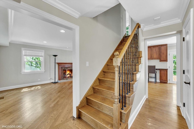 950 Belmar Ln, Buffalo Grove, IL 60089 - stairway with a brick fireplace, ornamental molding, wood finished floors, and recessed lighting