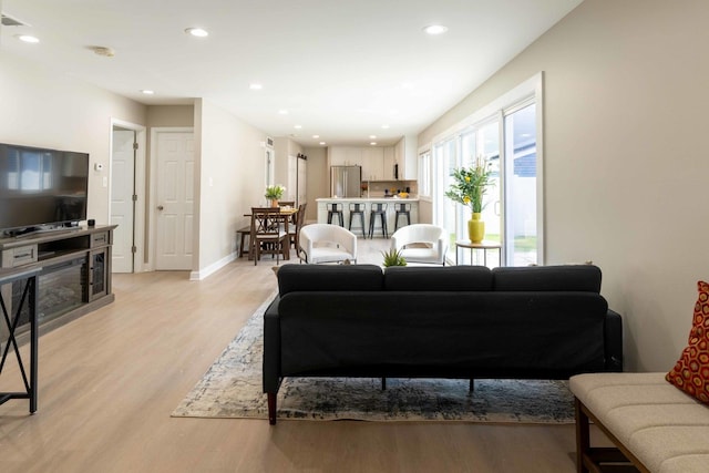 129 Highbury Dr, Elgin, IL 60120 - living room featuring light wood finished floors and recessed lighting