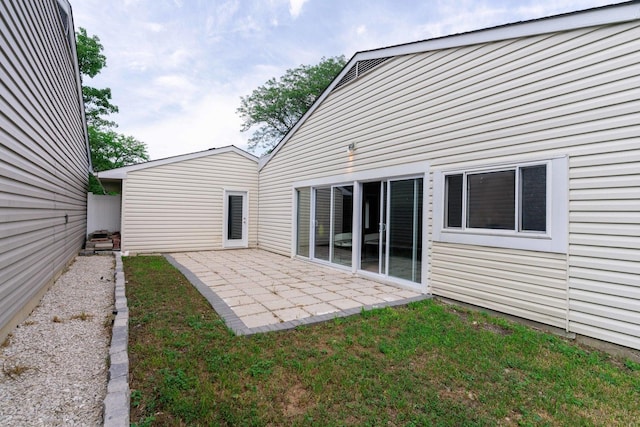 129 Highbury Dr, Elgin, IL 60120 - back of house featuring a patio area and a yard