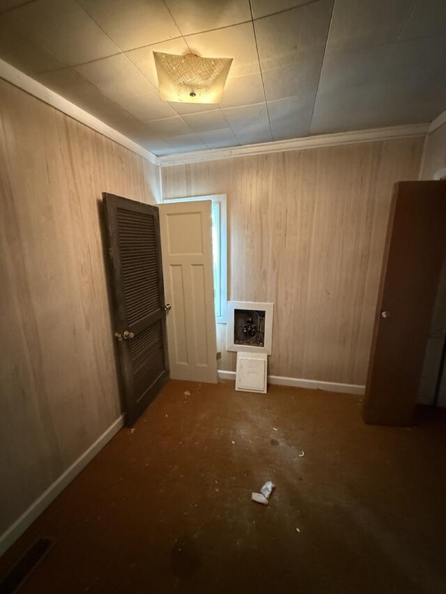 24576 W Norelius Ave, Round Lake, IL 60073 - empty room featuring wooden walls and baseboards