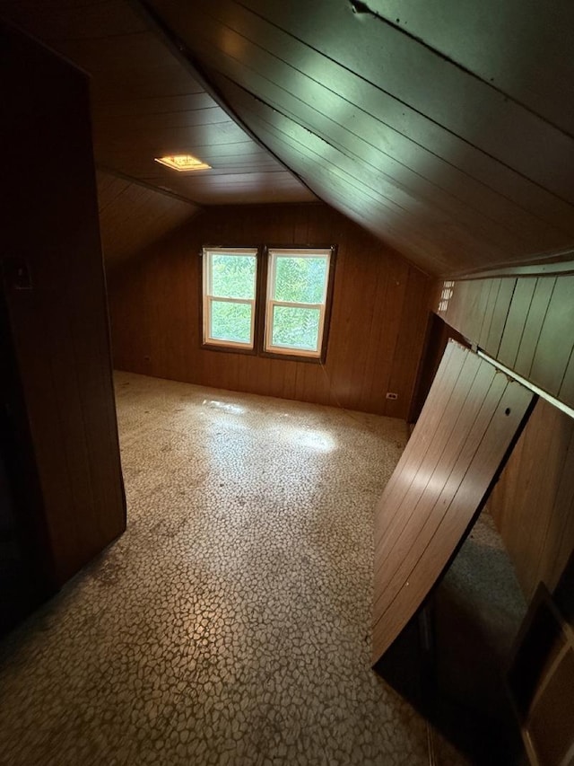 24576 W Norelius Ave, Round Lake, IL 60073 - additional living space with vaulted ceiling, wood walls, and wooden ceiling