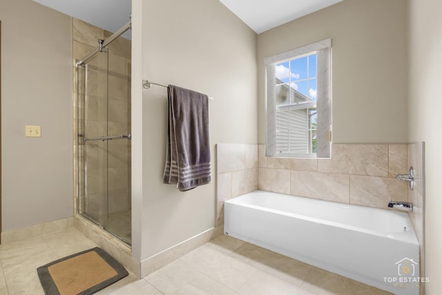 951 Viewpoint Dr, Lake In The Hills, IL 60156 - bathroom featuring tile patterned flooring, a garden tub, and a shower stall