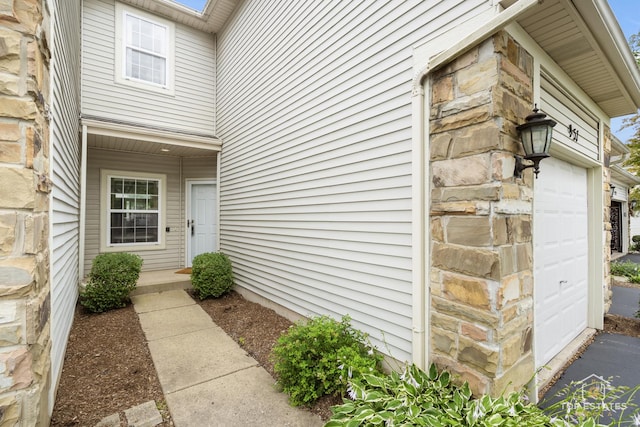 951 Viewpoint Dr, Lake In The Hills, IL 60156 - doorway to property with a garage