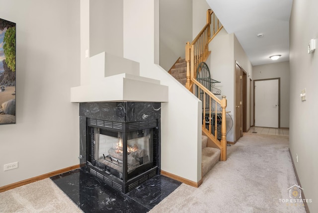 951 Viewpoint Dr, Lake In The Hills, IL 60156 - stairs with carpet and a multi sided fireplace