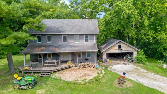 3457 W Hamilton Rd, Monee, IL 60449 - view of front of property with an outbuilding, a front lawn, covered porch, a detached garage, and roof with shingles