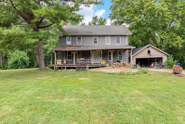 3457 W Hamilton Rd, Monee, IL 60449 - view of front of property featuring a detached garage, a porch, an outbuilding, and a front yard