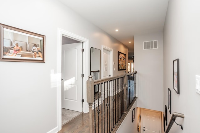4634 S Langley Ave, Chicago, IL 60653 - hall featuring an upstairs landing, wood finished floors, and recessed lighting