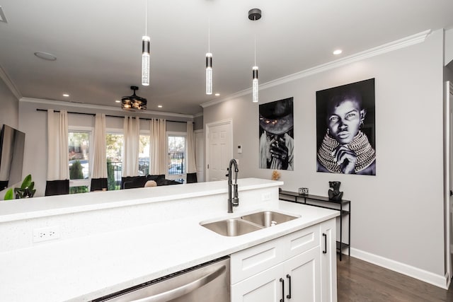 4634 S Langley Ave, Chicago, IL 60653 - kitchen featuring crown molding, light countertops, white cabinets, decorative light fixtures, and dark wood-style flooring