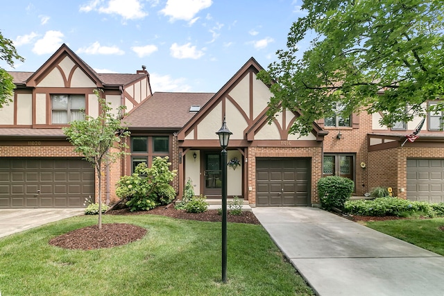 11016 Eaton Ct, Westchester, IL 60154 - english style home featuring stucco siding, brick siding, driveway, a front yard, and a shingled roof