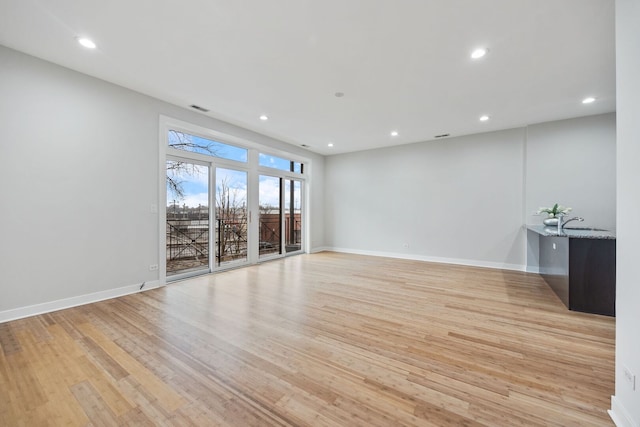 3130 W Walton St Unit 3, Chicago, IL 60622 - spare room with light wood finished floors and recessed lighting