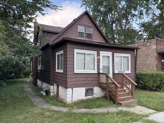 269 E 23rd St, Chicago Heights, IL 60411 - bungalow with a chimney and a front lawn