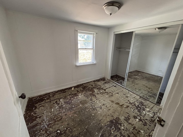 269 E 23rd St, Chicago Heights, IL 60411 - unfurnished bedroom with a closet and baseboards