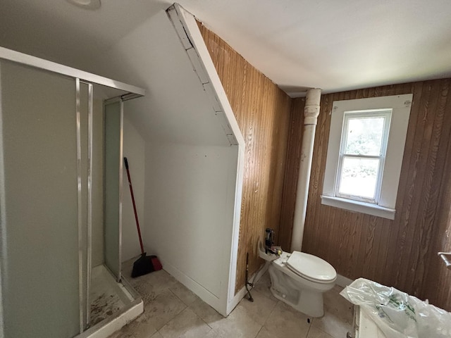 269 E 23rd St, Chicago Heights, IL 60411 - bathroom with a stall shower, wooden walls, tile patterned floors, and a bidet