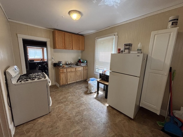 269 E 23rd St, Chicago Heights, IL 60411 - kitchen featuring white appliances, ornamental molding, stone finish flooring, and brown cabinets