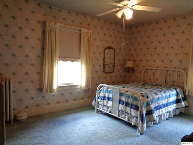 215 S 16th St, Quincy, IL 62301 - bedroom with wallpapered walls, carpet flooring, and ceiling fan
