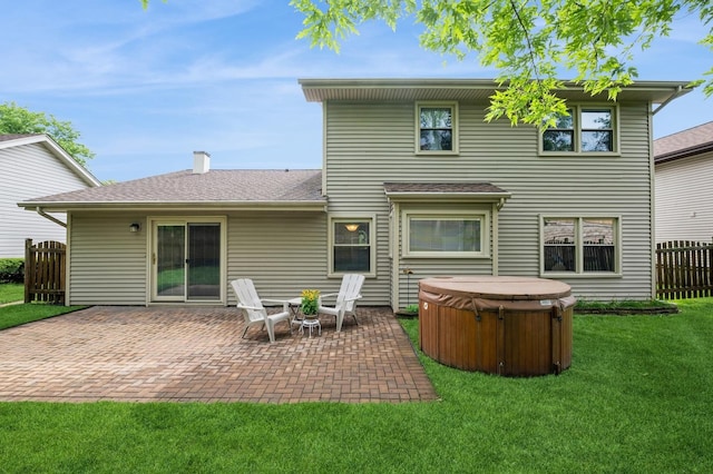 872 Asbury Ln, Schaumburg, IL 60193 - rear view of property featuring a hot tub, a patio, and roof with shingles