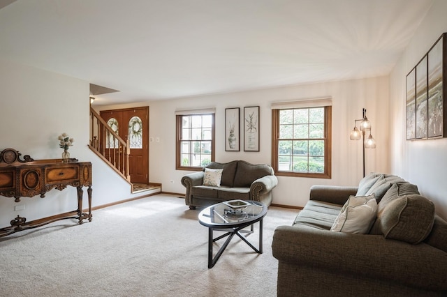 872 Asbury Ln, Schaumburg, IL 60193 - carpeted living room with stairs and baseboards
