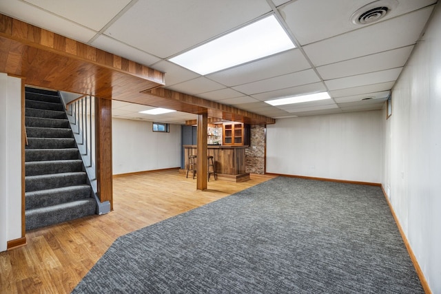 267 N Idlewild Ave, Mundelein, IL 60060 - finished below grade area featuring a drop ceiling, stairway, and wood finished floors