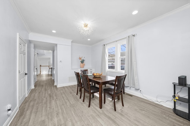 3039 S Kolin Ave, Chicago, IL 60623 - dining area featuring light wood-type flooring, ornamental molding, and recessed lighting