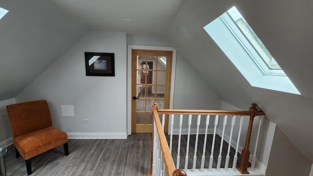 3039 S Kolin Ave, Chicago, IL 60623 - additional living space featuring a skylight, vaulted ceiling, and wood finished floors