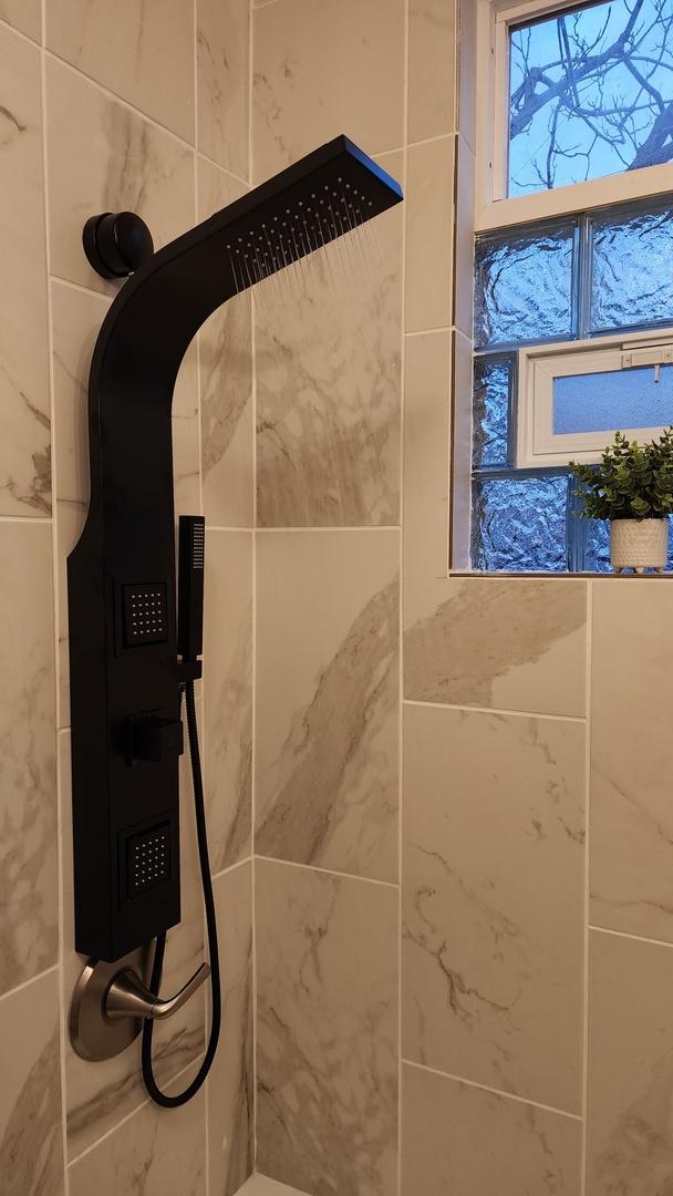 3039 S Kolin Ave, Chicago, IL 60623 - bathroom view of a tile shower