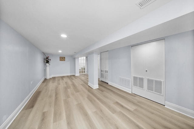 3039 S Kolin Ave, Chicago, IL 60623 - finished below grade area with recessed lighting and light wood-style floors