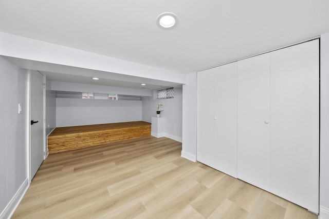 3039 S Kolin Ave, Chicago, IL 60623 - finished basement featuring light wood-type flooring and baseboards