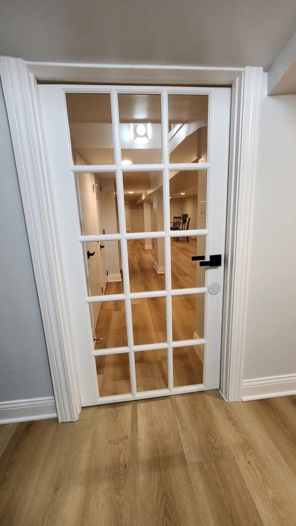 3039 S Kolin Ave, Chicago, IL 60623 - detailed view of french doors and wood finished floors