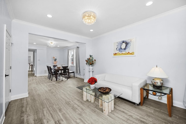3039 S Kolin Ave, Chicago, IL 60623 - living area featuring a chandelier, wood finished floors, crown molding, and recessed lighting
