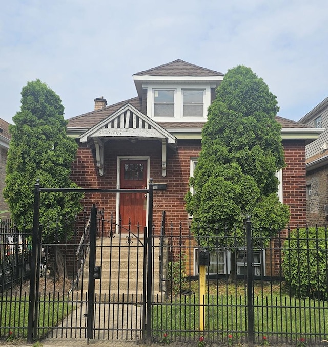 5330 S California Ave, Chicago, IL 60632 - bungalow with a fenced front yard, brick siding, and a shingled roof