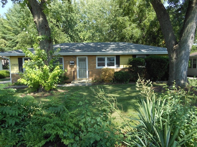 15409 S Union Pl, Plainfield, IL 60544 - ranch-style house with brick siding and a front yard