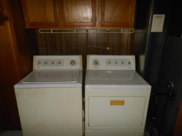 15409 S Union Pl, Plainfield, IL 60544 - laundry room with cabinet space and washing machine and dryer