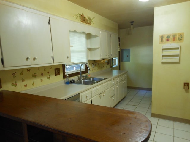 15409 S Union Pl, Plainfield, IL 60544 - kitchen with light tile patterned floors, electric panel, white cabinets, light countertops, and open shelves