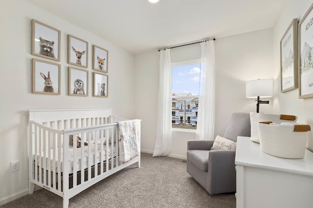 6550 Linden Trl Unit E, Wonder Lake, IL 60097 - bedroom featuring a nursery area and carpet floors