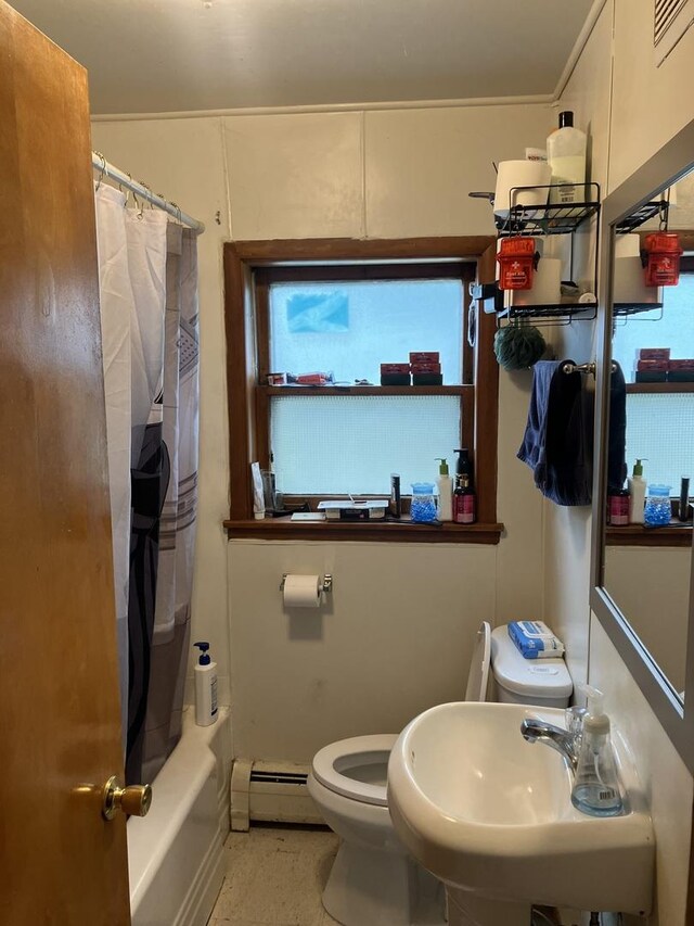 220 S 9th Ave, Maywood, IL 60153 - bathroom featuring a baseboard heating unit and shower / bath combo