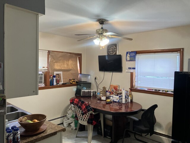 220 S 9th Ave, Maywood, IL 60153 - dining area with a ceiling fan and baseboard heating