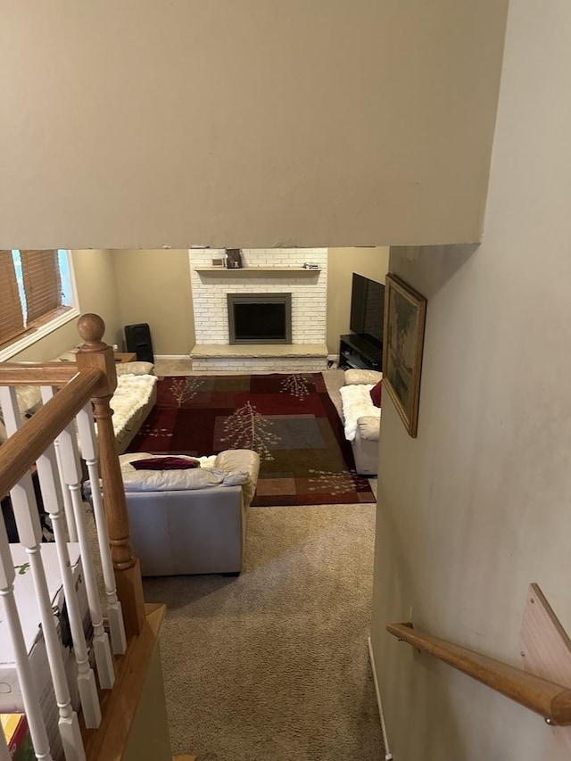 562 Willow Rd, Matteson, IL 60443 - carpeted living room featuring a brick fireplace