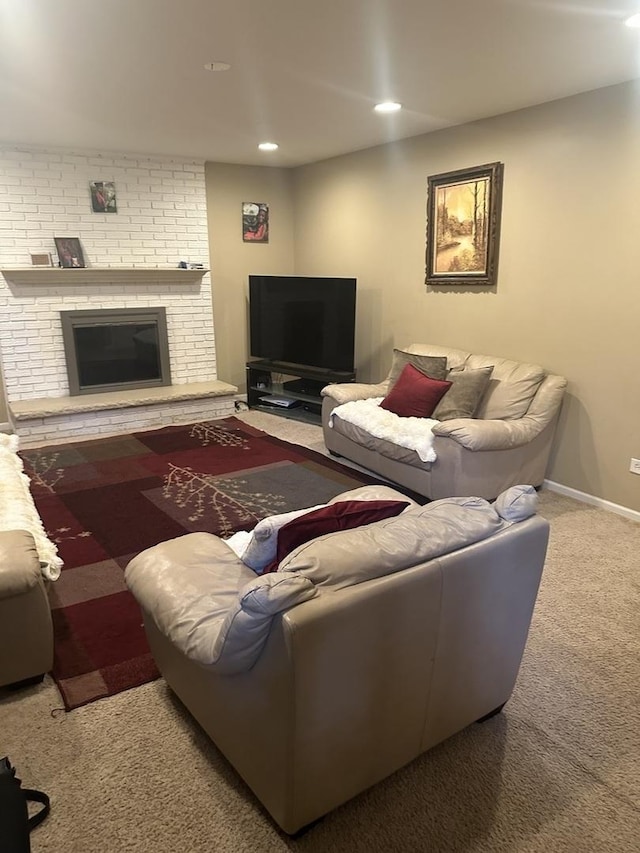 562 Willow Rd, Matteson, IL 60443 - carpeted living area featuring a brick fireplace and recessed lighting