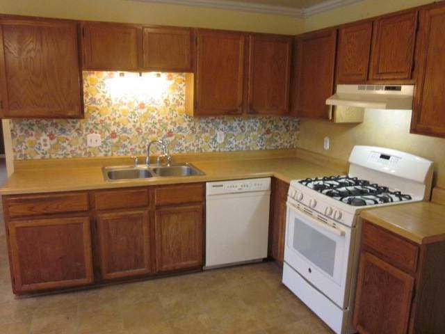 316 Brookwood Trl, Mchenry, IL 60050 - kitchen featuring white appliances, under cabinet range hood, light countertops, brown cabinets, and ornamental molding