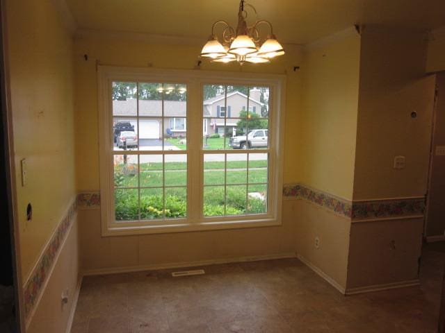 316 Brookwood Trl, Mchenry, IL 60050 - unfurnished dining area featuring a chandelier and baseboards