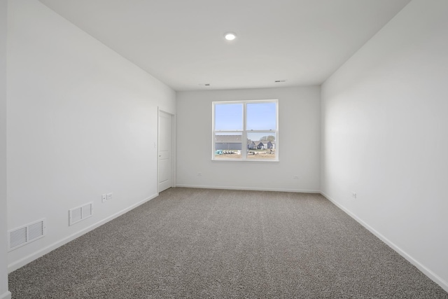 14628 S Azalia Cir, Plainfield, IL 60544 - carpeted empty room with baseboards and recessed lighting