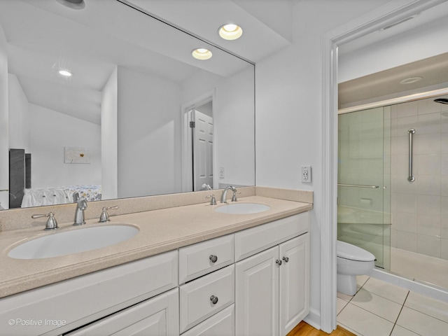 1039 Deerfield Pl Unit 1039, Highland Park, IL 60035 - full bathroom with double vanity, a shower stall, and recessed lighting